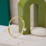 Load image into Gallery viewer, Blisse Allure Luxury Gold Bracelet with Emerald - Cut Diamond - Taraash
