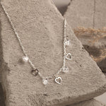 Load image into Gallery viewer, Blisse Allure Sterling Silver Dangling Heart Charms Necklace - Taraash