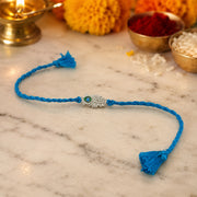 Peacock Feather Design Cotton Thread Chandi Rakhi for Men