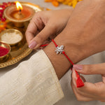 Load image into Gallery viewer, Dancing Ganesha Design Red Cotton Thread Rakhi for Brother